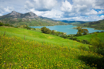 Panoramic scenic view of blue lake and green valley in Zahara, Spain