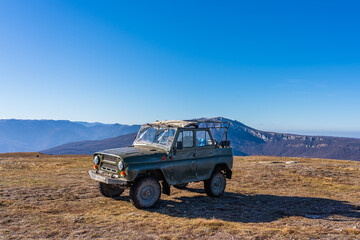 Antique Russian off-road car on top of Mount Demerdzhi in Crimea in winter