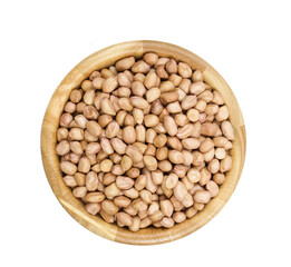Peanuts on wooden bowl isolated on white background top view.