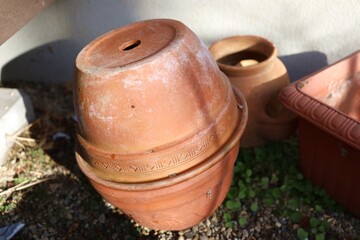 A flowerpot left in the garden in winter.Taken in January 2022
