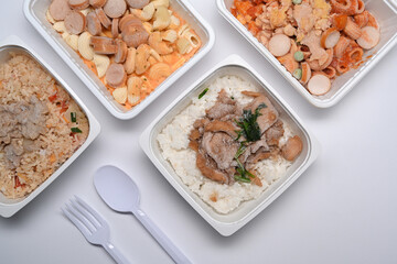Above view several frozen meal on white background.
