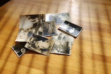 Title: Organize relics. A photo of my late mother when she was young.