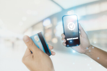 close up of mobile phone showing payment successful, payment transfer, e-commerse and online shopping concept,shopping mall as background, digital marketing
