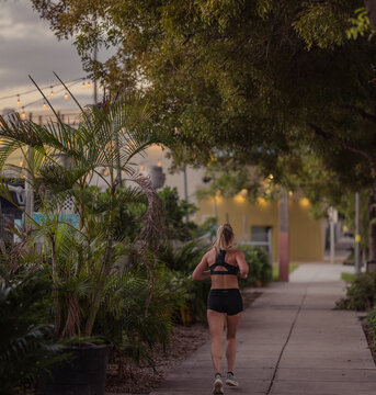 woman walking on the street running sport lifestyle Miami Florida  