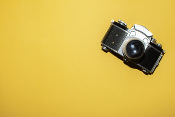 Old photo cameras with a metal body, unique design and lens. Camera for home. Layout for photo...