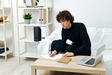 man sitting at the table in a black sweater lessons communication