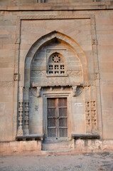 Entrance carved gate of Habashi Ghumat, Dargah Of Sath Peer Baba located in Junnar, near Pune, Maharashtra, India