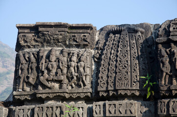 Carved idol on the outer wall of Kukdeshwar Temple, dedicated to Lord Shiva, it lies on the banks...