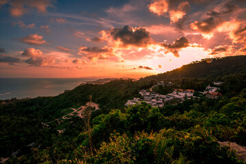 The background of the sea by the evening sea, with natural beauty (sea water, rocks, sky) and fishermen are fishing by the river bank, is a pleasure during travel.