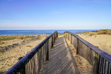 Fototapeta na wymiar pathway wooden to access beach in talmont saint hilaire vendee France