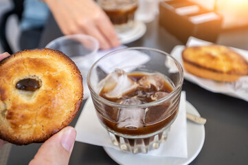 A greedy specialty of Salento, Puglia, Italy. Coffee with ice and almond syrup accompanied by...