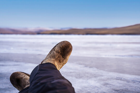 Arctic boots mukluks or high fur boots - a type of fur shoes, boots for cold and very cold climates worn by local residents on Lake Baikal