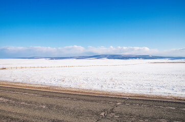 Automobile road on a winter sunny day. Family travel concept to ski resort. Winter or spring break.