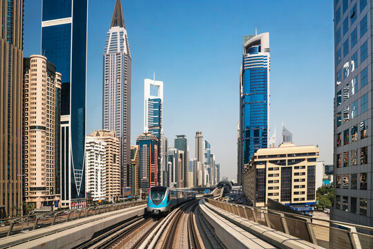 Dubai city center, with skyscrapers and train metro, United Arab Emirates.