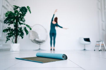 silhouette of a woman doing yoga