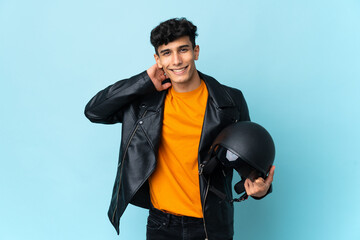 Argentinian man with a motorcycle helmet laughing