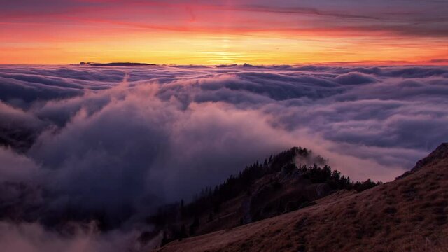 Time lapse of Sunset autumn mountains above the clouds during the weather inversion Fatra mountains in Slovakia, beautiful landscape
