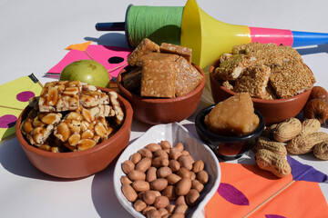 Makar sankranti wallpaper with Sankranti festival special dishes served and eaten like Peanut...