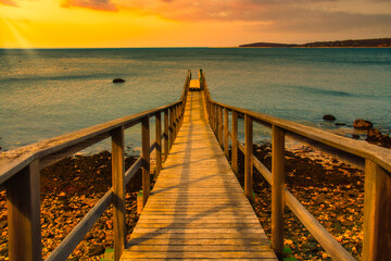 Obraz premium wooden bridge over the river