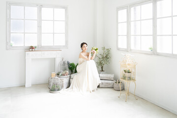 Obraz na płótnie Canvas ウェディングドレスを着た花嫁