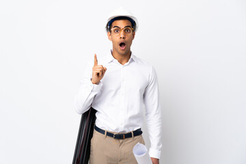 African American architect man with helmet and holding blueprints over isolated white background _ intending to realizes the solution while lifting a finger up