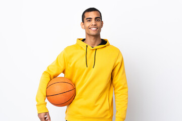 Obraz premium African American man over isolated white background playing basketball