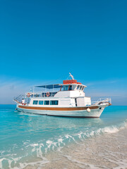 cruise boat at egremni beach greece vacation