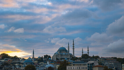 Istanbul mosques. Dramatic clouds and Suleymaniye Mosque at sunset