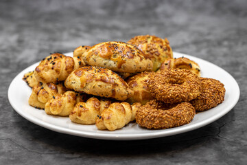 Sesame crackers cookies on dark background. Snack cookies. close up