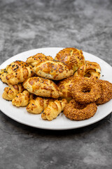 Sesame crackers cookies on dark background. Snack cookies. close up