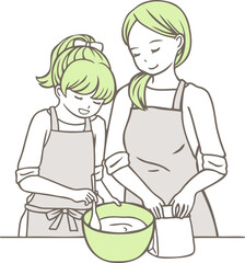 お菓子作りをする親子