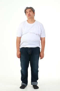 fat man wearing white shirt standing on a white background He felt stressed. weight loss concepts, health problems of obese people