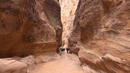 Tourist route through the gorge to Petra - Nabataean rock temple. Jordan