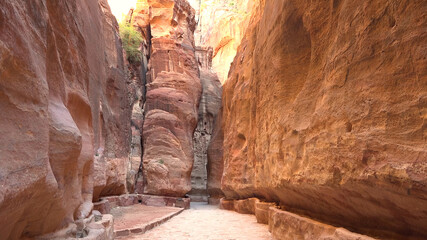 Tourist route through the gorge to Petra - Nabataean rock temple. Jordan