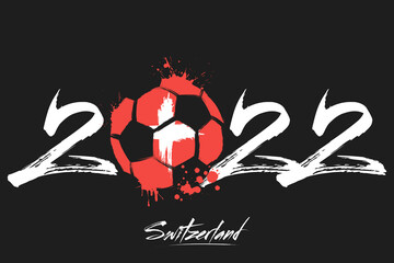 Numbers 2022 and a abstract soccer ball painted in the colors of the Spain flag. 2022 and flag of Spain in the form of a soccer ball made of blots. Vector illustration on isolated background