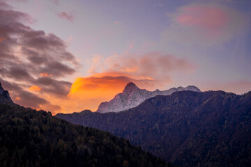 Fototapeta na wymiar Fire looking clouds at sunrise in the mountains
