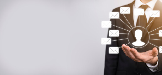 Male hand holding letter icon,email icons .Contact us by newsletter email and protect your personal...