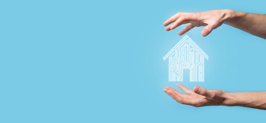 Hand hold house icon.Smart home controlled, intelligent house, and home automation app concept.Pcb...
