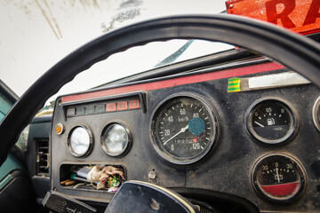 Dashboard in an old truck close-up. Speedometer and gauges