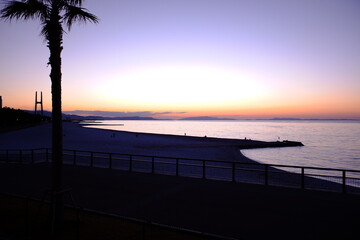 Obraz premium 夕陽と海岸風景