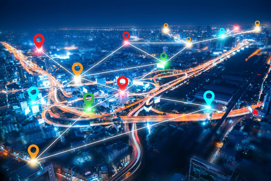 colorful pin landmark location on aerial view of modern downtown skyline and highway transportation in modern city with location link network connection for meter verse trend worldwide link technology