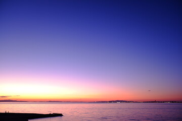 Obraz premium 夕陽と海岸風景
