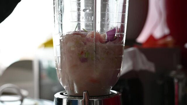 3 Preparing Leche de tigre, a Peruvian ceviche dish