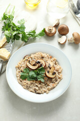 Concept of tasty food with risotto with mushrooms