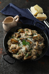 Concept of tasty food with risotto with mushrooms