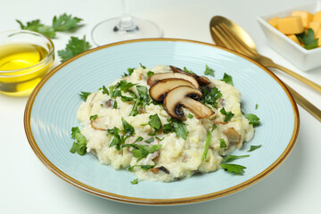 Concept of tasty food with risotto with mushrooms, close up