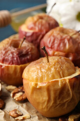 Concept of tasty food with baked apples, close up