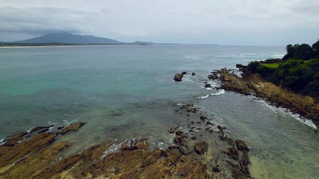 Overcast and cloudy morning by the seaside at Bermagui in the Eurobadalla Shire on the South Coast of NSW, Australia.