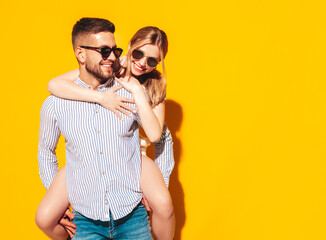 Sexy smiling beautiful woman and her handsome boyfriend. Happy cheerful family having tender...
