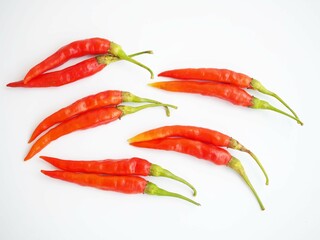 Red peppers on a white background. closeup photo, blurred.